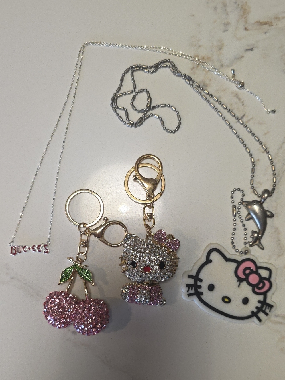 Bundle: Hello Kitty & Sparkle Cherry Keychain Set Dolphin Bucees Necklace